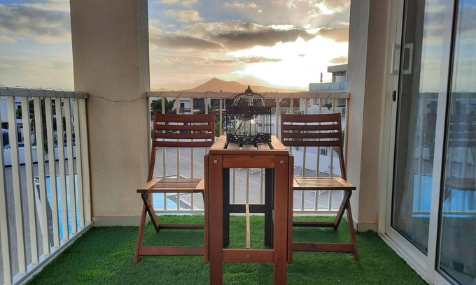 Costa Teguise Apartment | Vacation 'Escape Senator Costa Teguise' with Shared Pool, Balcony and Wi-Fi