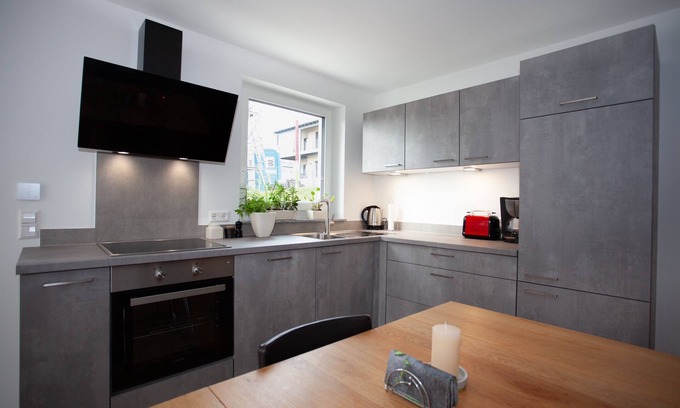 Ludwigshafen Apartment | Vacation happiness. Modern vacation apartment with private garden