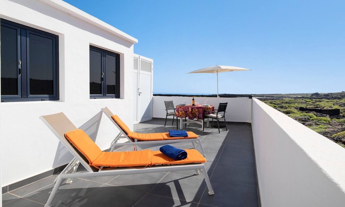 Orzola House | Vacation Home "Casa Paco" with Sea View, Private Terrace & Wi-Fi