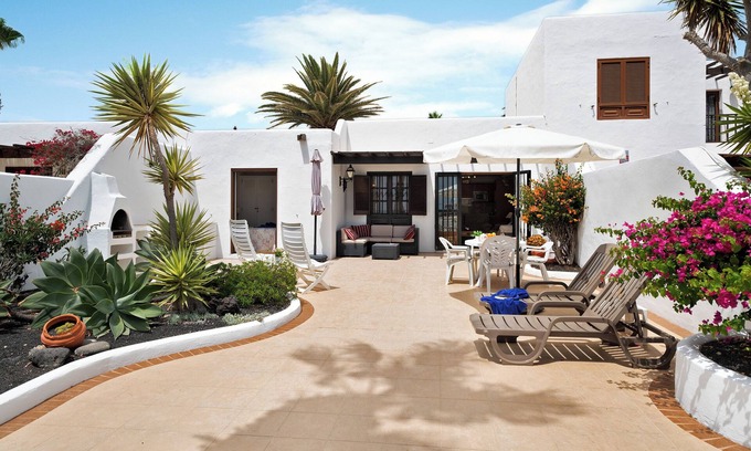 Playa Blanca Apartment | Vacation Home 'Puerto Chico B' with Sea View, Shared Pool & Wi-Fi
