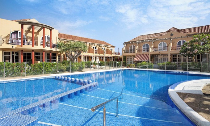 Meloneras Apartment | Vacation Home 'Sunrise Maspalomas' with Mountain View, Shared Pool & Wi-Fi