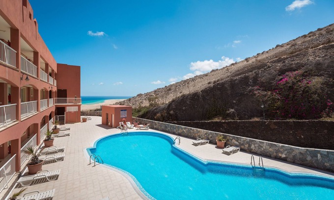 Pajara Apartment | Vacation 'Home Sweet Home with Ocean View' with Sea View, Shared Pool and Wi-Fi