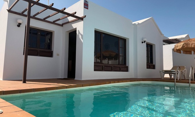 Tias House | Vacation Home 'Timanfaya' with Sea View, Private Pool and Wi-Fi