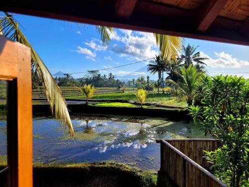 Tampaksiring Villa | Villa Baruna - 2 storey teak villa - volcano view