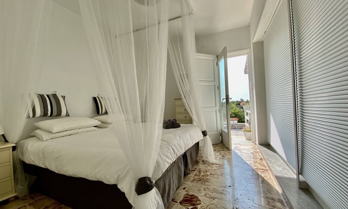 Costa Merlata Villa | Villa right on the beach. Designed to step off the world directly onto the beach