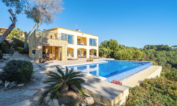 Tamarit Villa | Villa 'The Beauty of Cala Tamarit' with Sea View, Pool, Wi-Fi and Garden