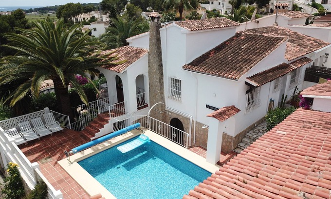 La Sabatera Villa | Villa with heated pool, beaches and town 10 mins walk, small sea view