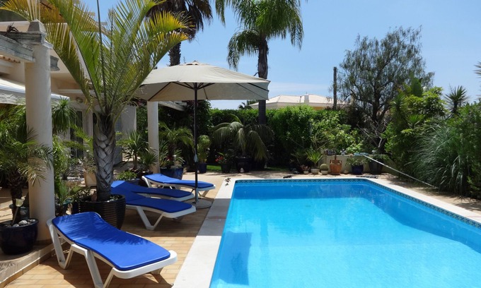 Porches House | Villa with pool in an exotic garden, just a few minutes' drive to the beach