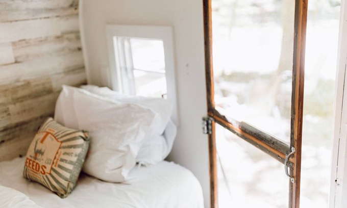 Gnaw Bone RV Rental | Vintage wood camper in Brown County