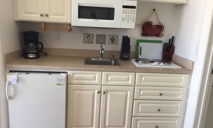 North End Condo | Walk to the beach, boardwalk and shopping! Pool on site, great location!