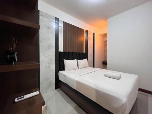 Panakkukang Apartment | Warm and Cozy 2BR Vida View Makassar Apartment By Travelio
