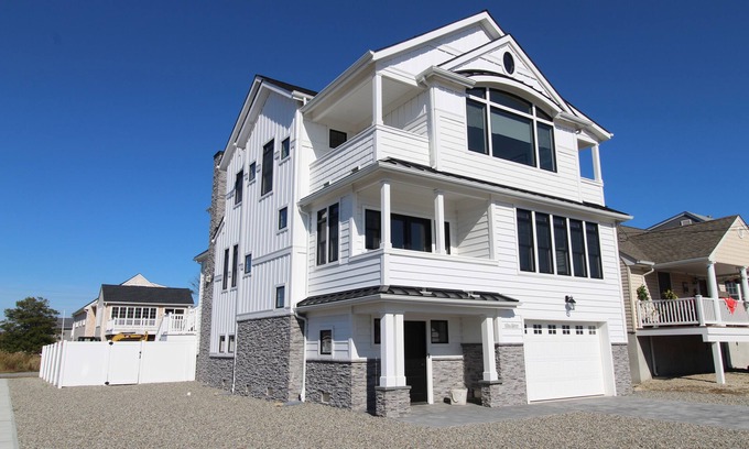 Point Pleasant Beach House | WASH115 | Breathtaking custom coastal 5BR 4ba home! Saltwater pool, cabana rm, views & more!
