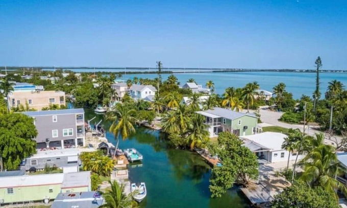 Bay Point House | Waterfront Bungalow with Dockage and fire pit