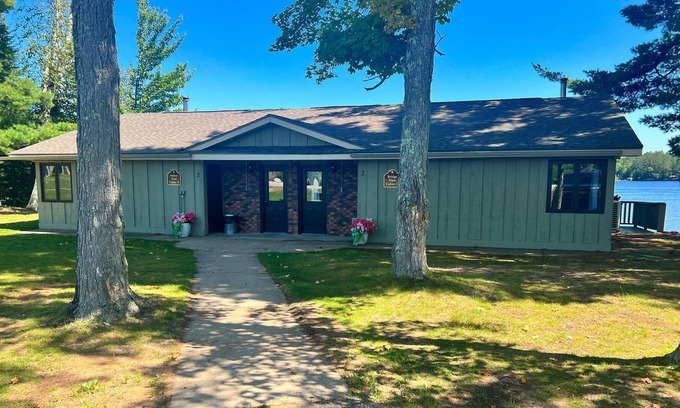 Three Lakes Cabin | Waterfront condos with pools, athletic courts, game room, grills & fireplaces