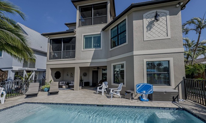 Bonita Springs House | Waterfront gulf access 4 Bedroom Home w Den & Heated Pool