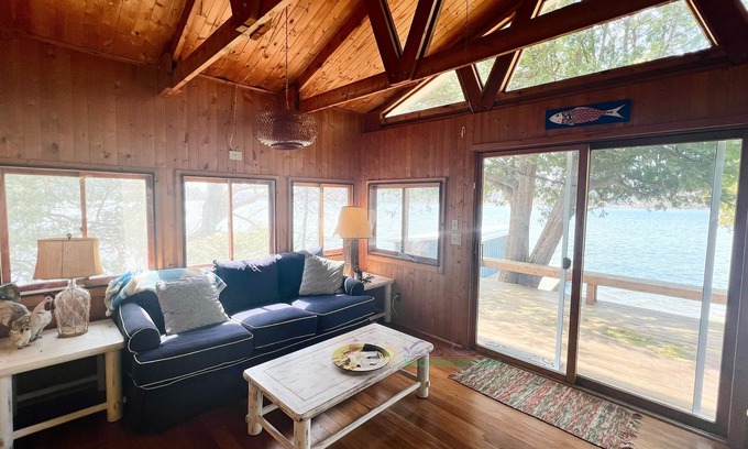 Lake Leelanau Cabin | Waterfront home and guest cottage on Lake Leelanau. Pet ok. Sleeps 11.