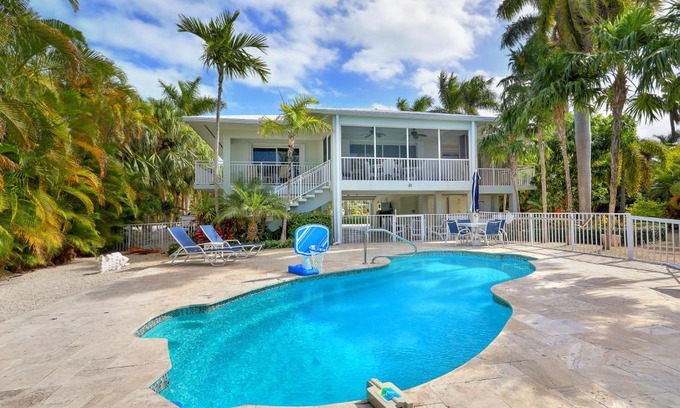Key Colony Beach House | Waterfront Luxury Home with Pool and Boat Dock home