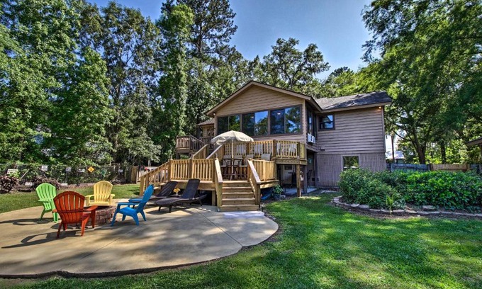 Midway House | Waterfront Midway Home with Sunroom and Large Yard
