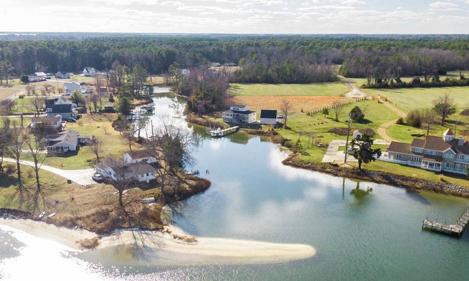 White Stone House | Waterfront Retreat w/Hot Tub, Game Room, Kayaks, 2 Kings, + more!