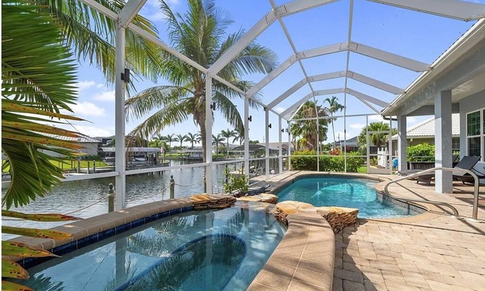 Pelican House | Waterfront retreat with Pool and Hot Tub