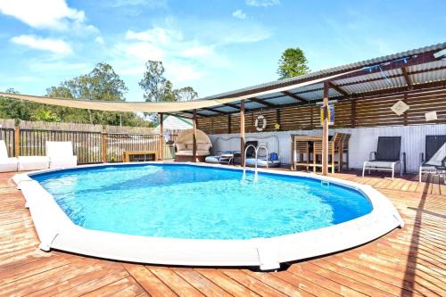 Tuggerawong House | Waterfront Retreat with Games for the Whole Family