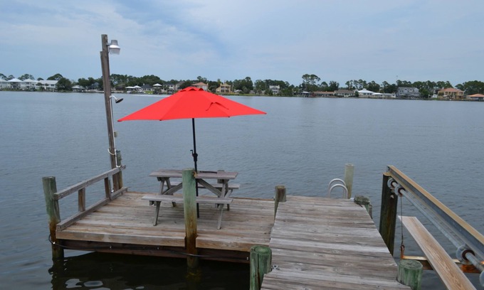 Biltmore Beach House | Waterfront Two Bedroom Beach house with Private Boat Dock