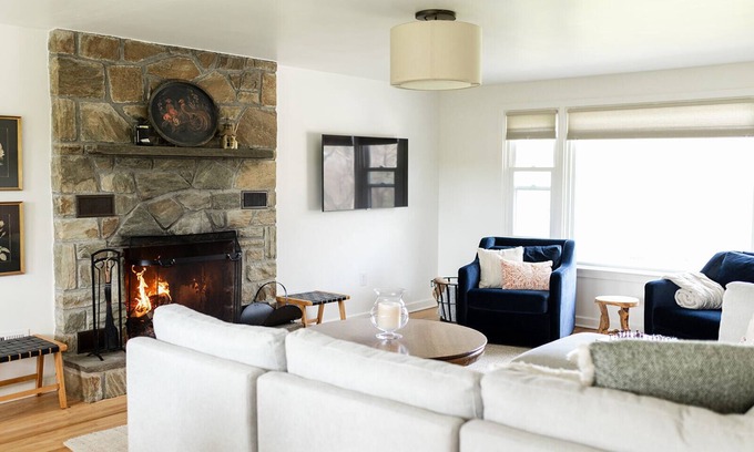 Fertility Cottage | Waterfront with Wood Fireplace + Outdoor Firepit + Paddleboat +1 mile to outlets