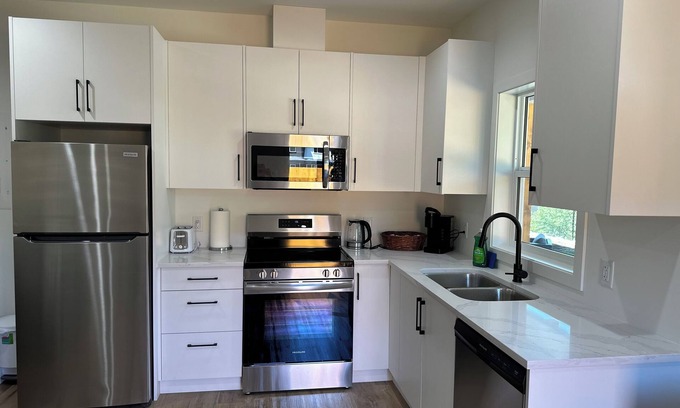 Langford Apartment | Whispering Trees a quiet home in a forested area of Langford.