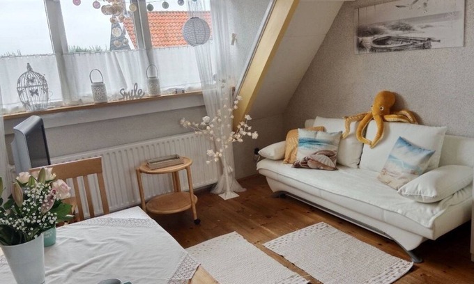 Westkapelle Apartment | Window view of the dunes! 10% weekly discount from August to December!