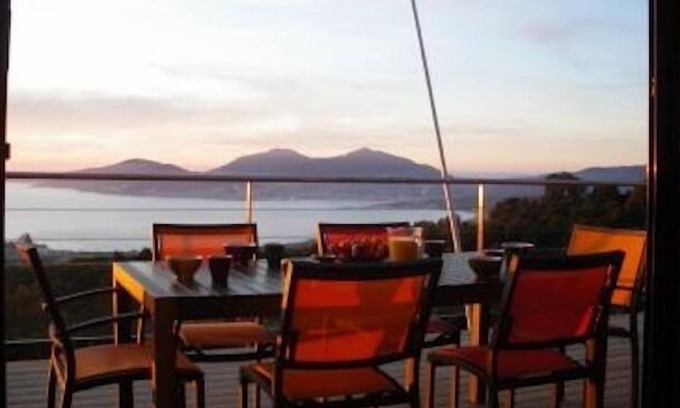 Pietrosella House | Wooden lodge on piles nestled in the scrubland,view over the Bay of Ajaccio