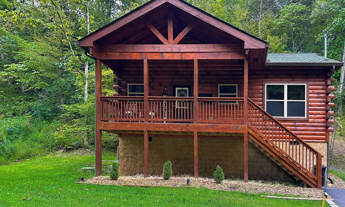 Sevierville Cabin | Woodland Retreat w/Hot Tub, Scenic Porches & Free Attraction Tickets