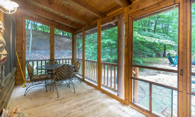 Saugatuck Cabin | Woodsy cabin with private hot tub, shared beach access & screened porch