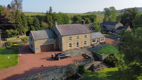 West Woodburn House | Yellow House