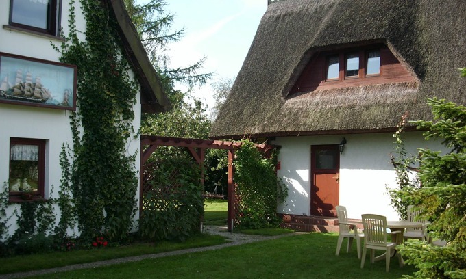 Ostseebad Prerow Apartment | You live in a quiet location under a typical thatched roof in Prerow