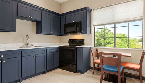 Family Room, 2 Queen Beds, Kitchenette, Corner (Efficiency, Non-Smoking)