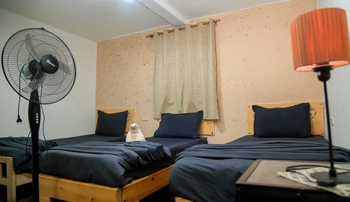 Standard Triple Room, 1 Bedroom, Non Smoking, Shared Bathroom