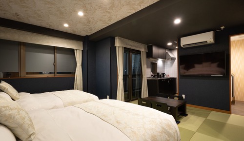 Deluxe Twin Room with Two Double Bed, 50%off on the second night of their stay