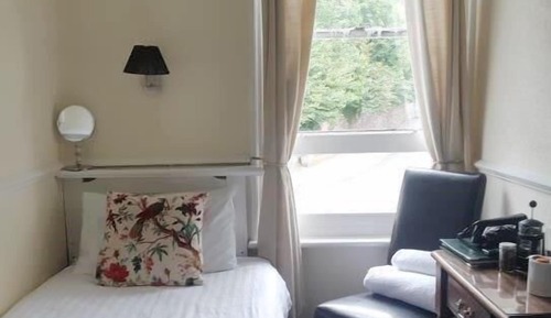 Standard Single Room, Shared Bathroom (Small)