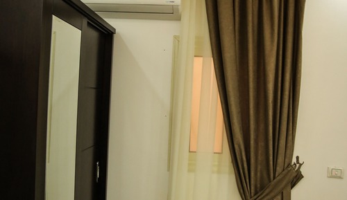 Signature Quadruple Room