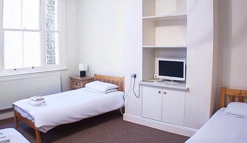 Basic Twin Room,Lower Ground Floor, Shower in room and shared toilet