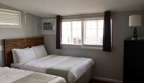 Palmetto Palm 1 bedroom Suite, 2 Queen Beds, living room, Kitchen, 2nd Floor Stair Access