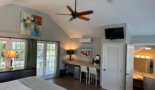 Royal Palm King Suite, 1 King Bed, Balcony, Pool and Garden view 2nd Floor Stair Access