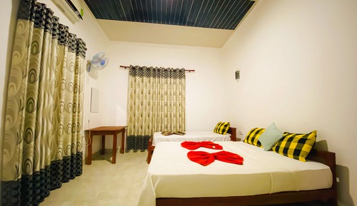 Deluxe Triple Room