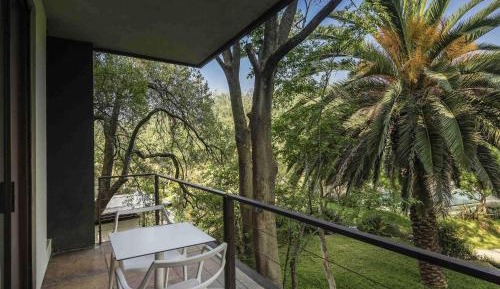 Deluxe King Suite with Garden and Pool View