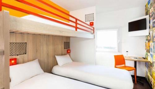 Break Room with Three Single Bunk Beds and Shared Bathroom