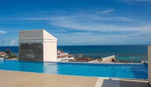 Three-Bedroom Apartment with Sea View