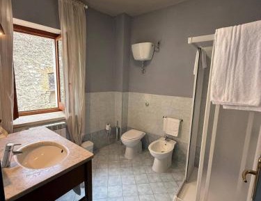 Quadruple Room with Private Bathroom