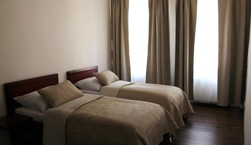 Quadruple Room with Private Bathroom