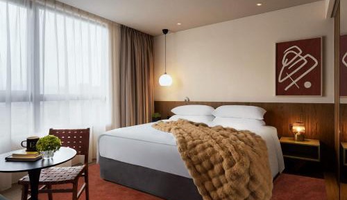 Deluxe Corner King Room with Sofa Bed