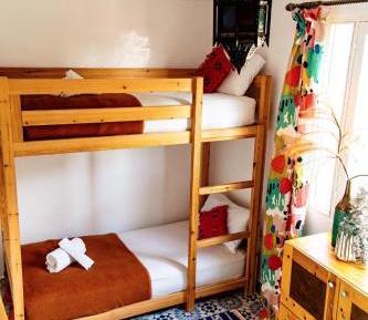 Quadruple Room with Shared Bathroom